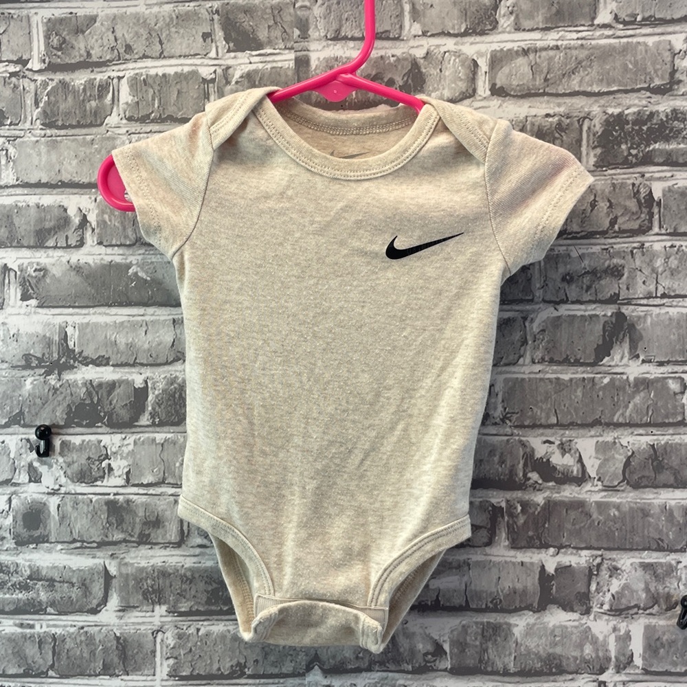 Nike onesie‎ tan color with black logo